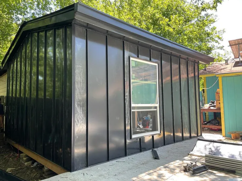 Black standing seam metal wall panels for Roof Inspection in Spring Hill